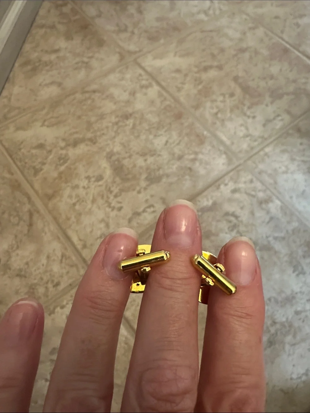 Gold Oval Cufflinks with Garnet Center